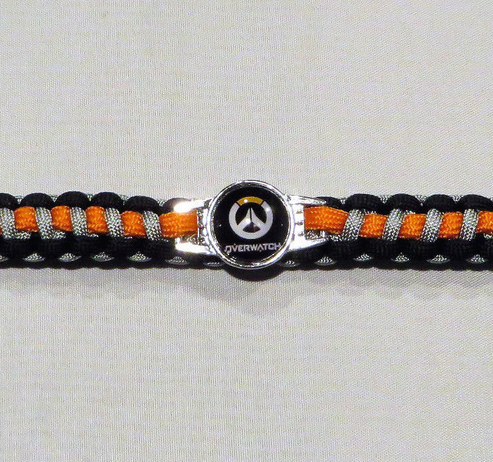 OVERWATCH LOGO POWERCORD 9″ ORANGE & BLACK SNAP ENCLOSURE UNISEX Bracelet