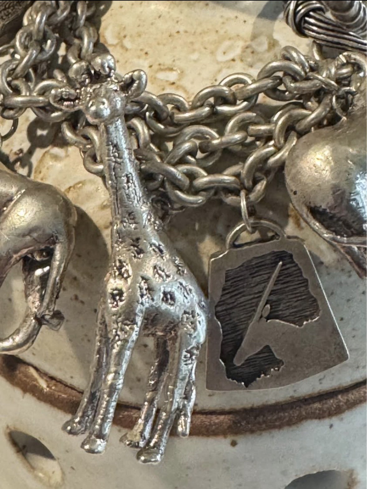 Signed Susan Cummings statement sterling silver African animal charm bracelet