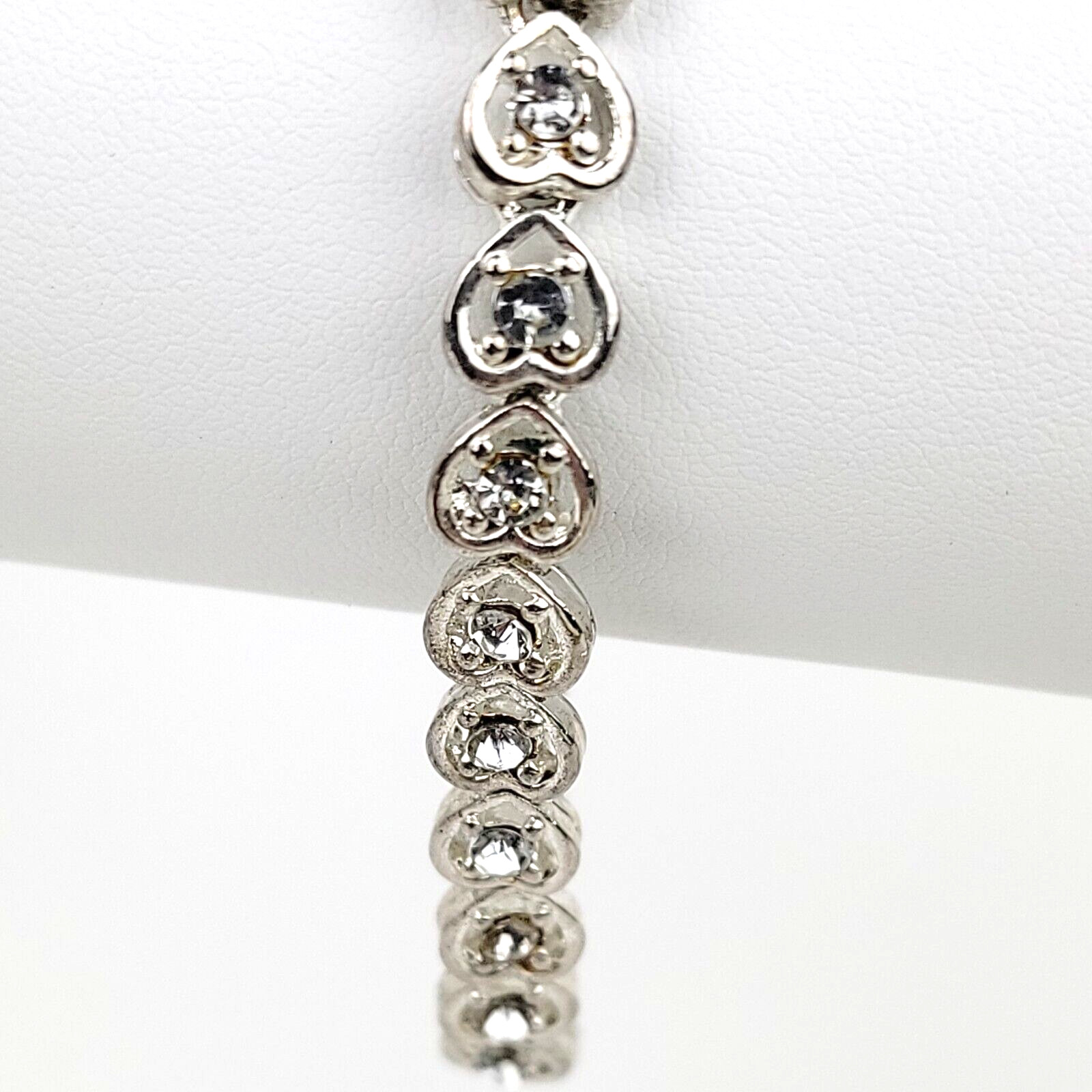 Heart Shaped Tennis Bracelet Silver Tone Link with Rhinestones Fold Over Clasp