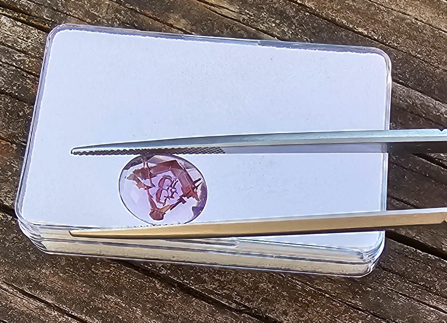 Amethyst 11.4×9.5mm Oval Loose Stone with Mason symbol