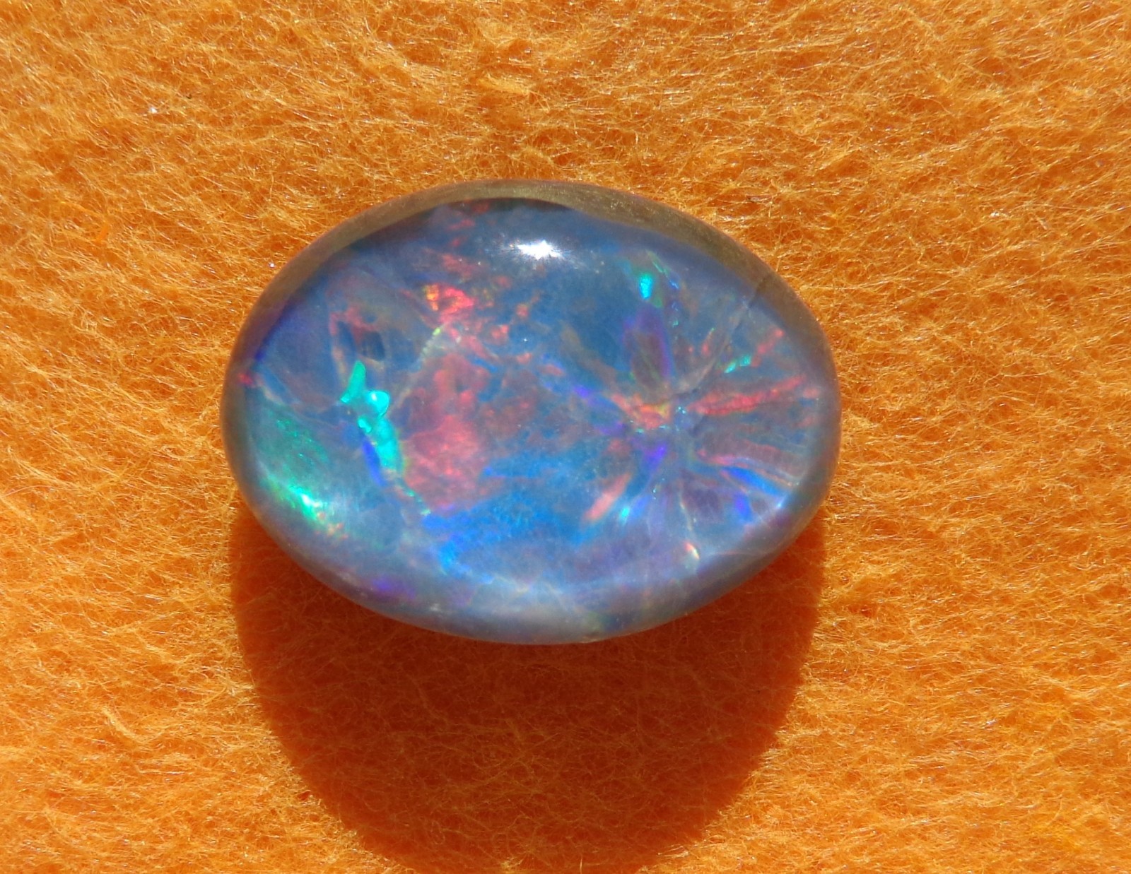Spencer Idaho Opal Triplet 15X20mm with a Blazing Green Fire in a Galaxy Pattern