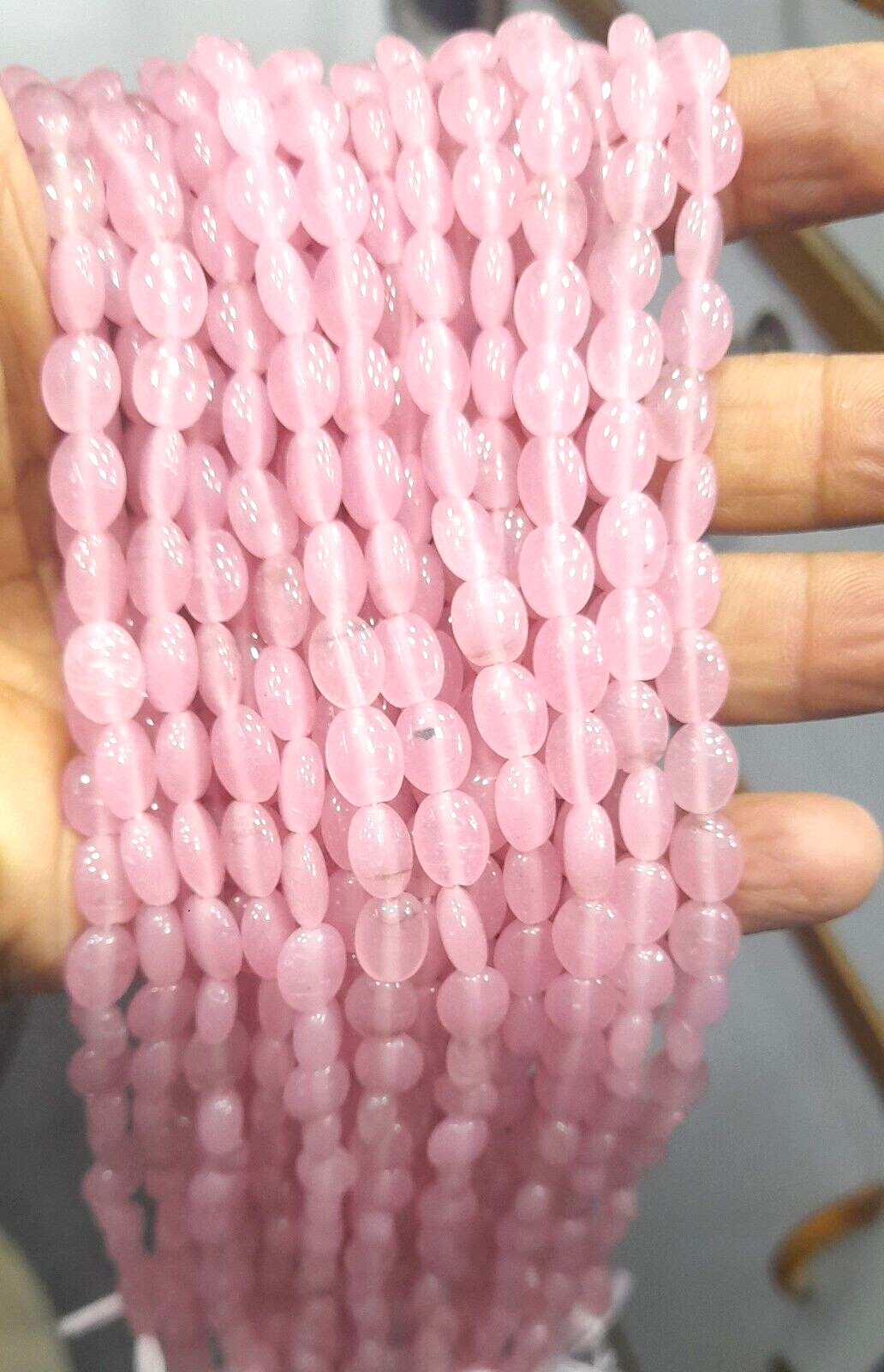 ROSE QUARTZ OVAL SMOOTH 5X7 MM 13 INCH 1 STRANDS