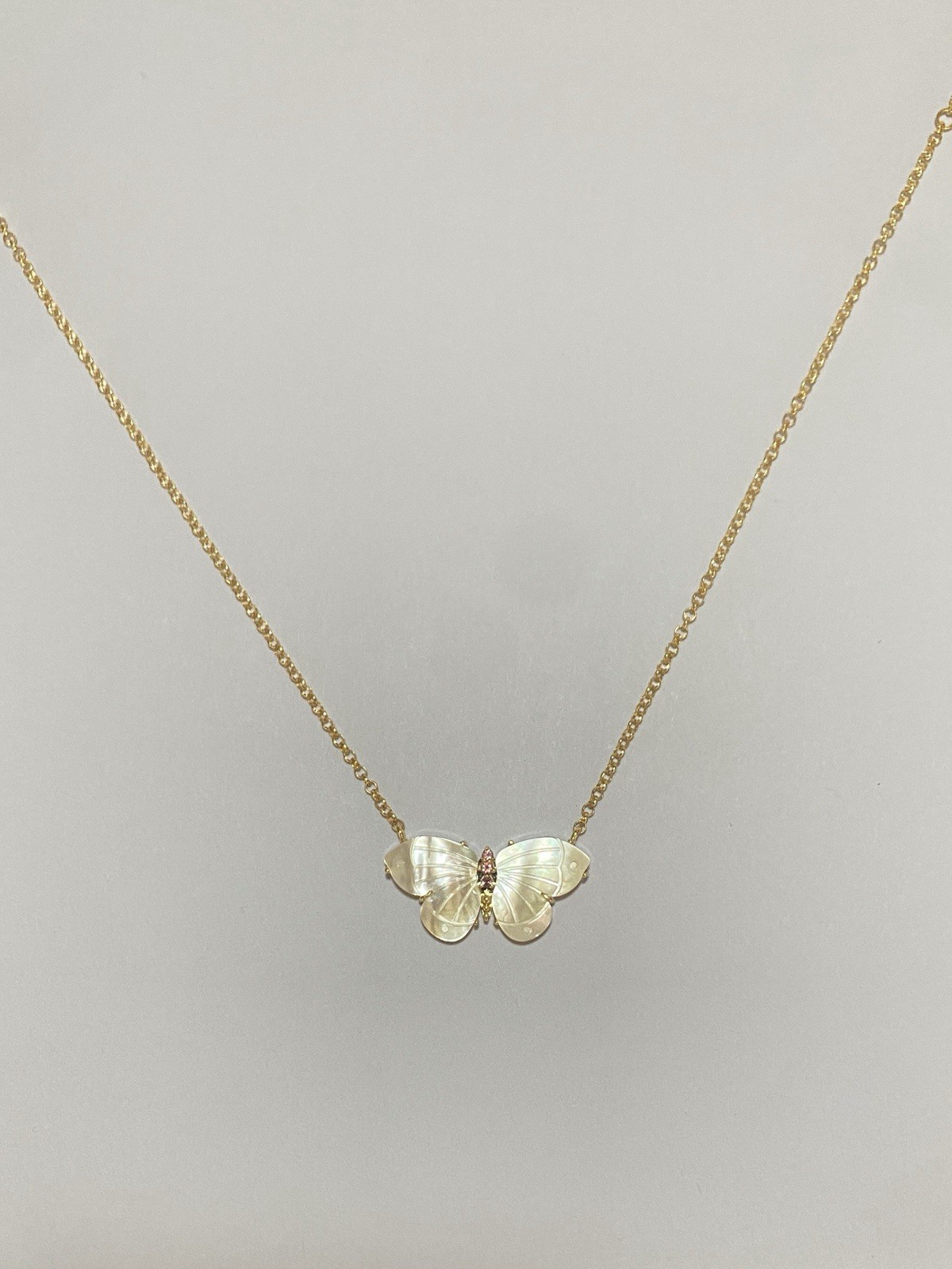 Jane Win “Free” Mother of Pearl Butterfly necklace.