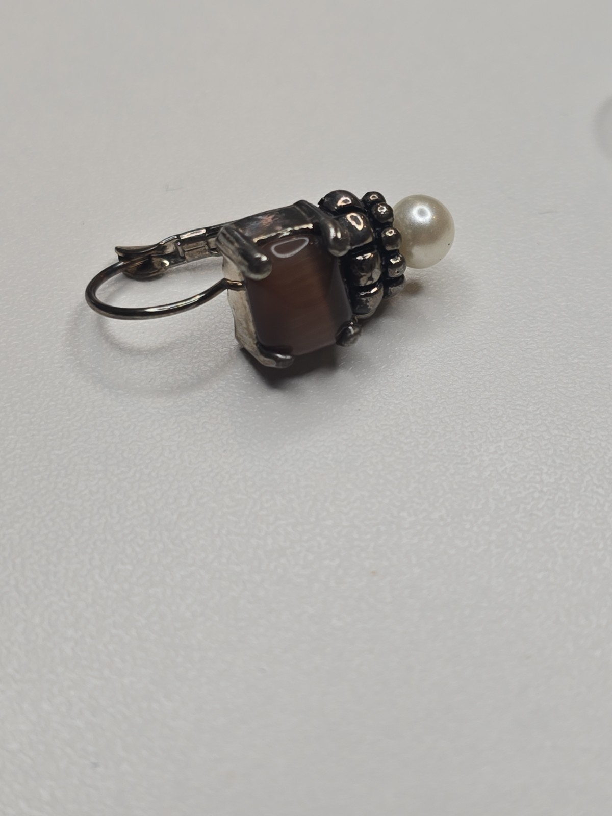 sterling silver Lagos earrings, smoky quartz stone and pearl accent.