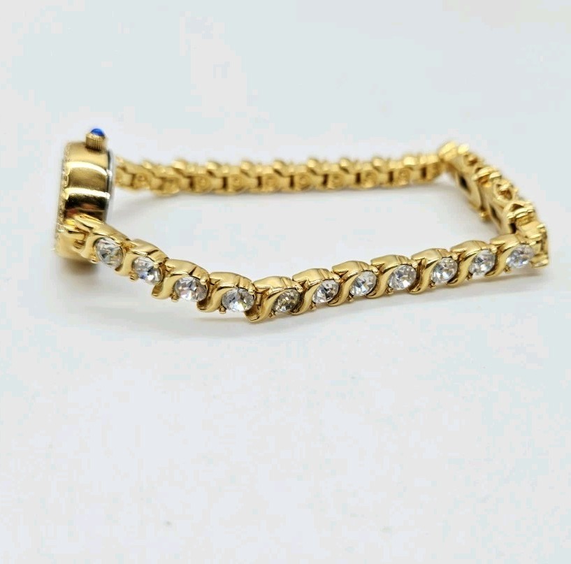 Nolan Miller Watch Tennis Bracelet Crystal Gold tone New battery Oval 7.25 in