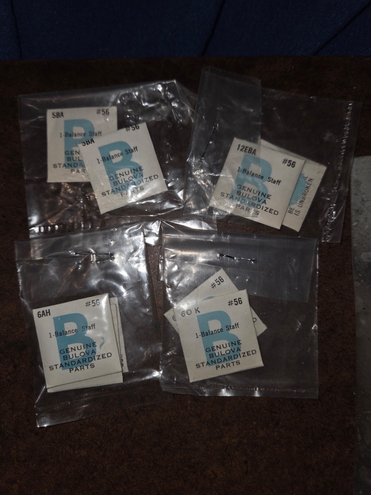 Twenty (20) Bulova balance staffs, sealed , NOS. See calibres in description.