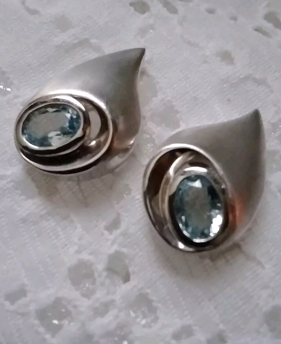 Unique Shape Blue Topaz Post Earrings Set In Satin Finish 925 Sterling Silver