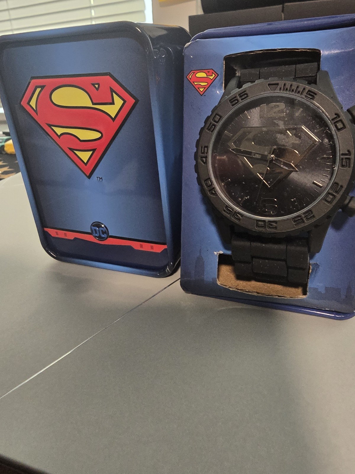Accutime Superman Men’s Quartz Analog Black Dial Silicone Strap w/ Tin Box