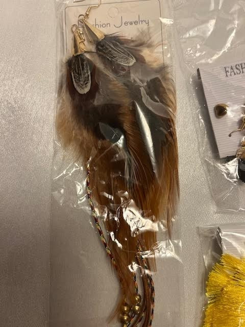 Lot #10: FEATHERS AND TASSELS JEWELRY: VARIETY ASSORTMENT NEW IN PACKAGES