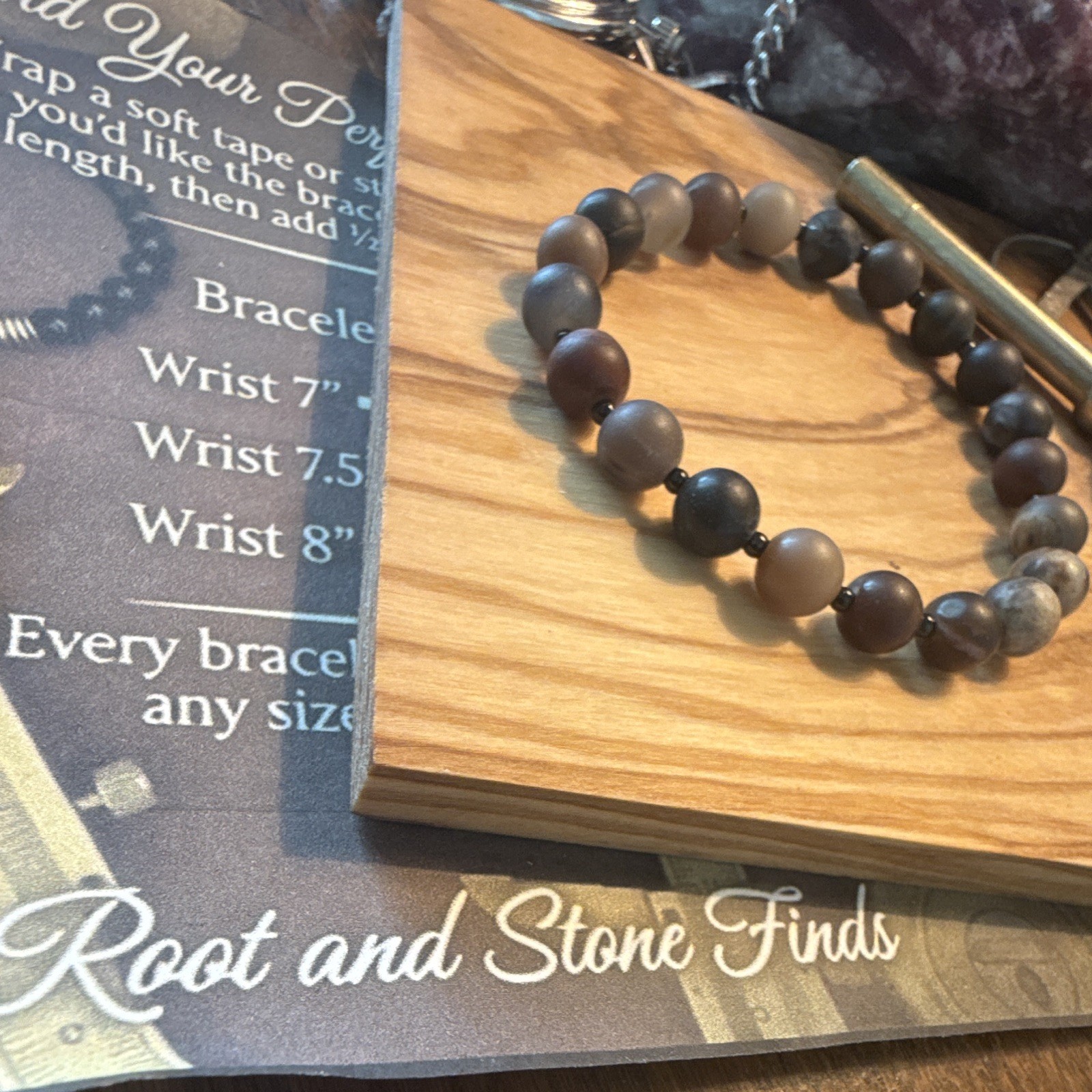 Petrified wood 6 mm and hematite spacers 6 1/2 inch but we can make it to any si