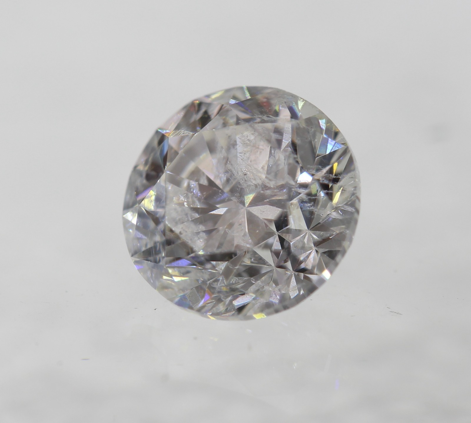 0.57 Carat F SI2 Round Brilliant Natural Enhanced MINED Loose Diamond 4.91mm
