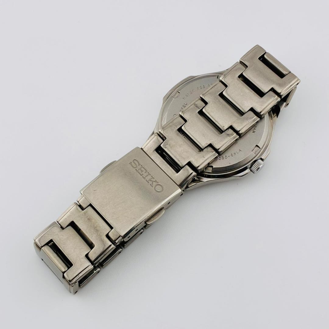 SEIKO Men’s Watch, Date Display, Original Strap, Solar Powered, Titanium
