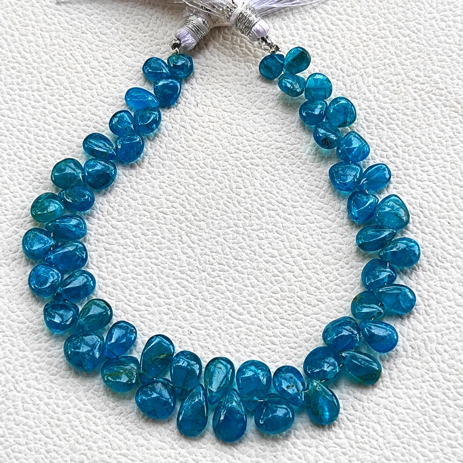 Madagascar Neon Blue Apatite Smooth Pear Shape Beads 6×4 to 8x6mm 7.5″ Strand