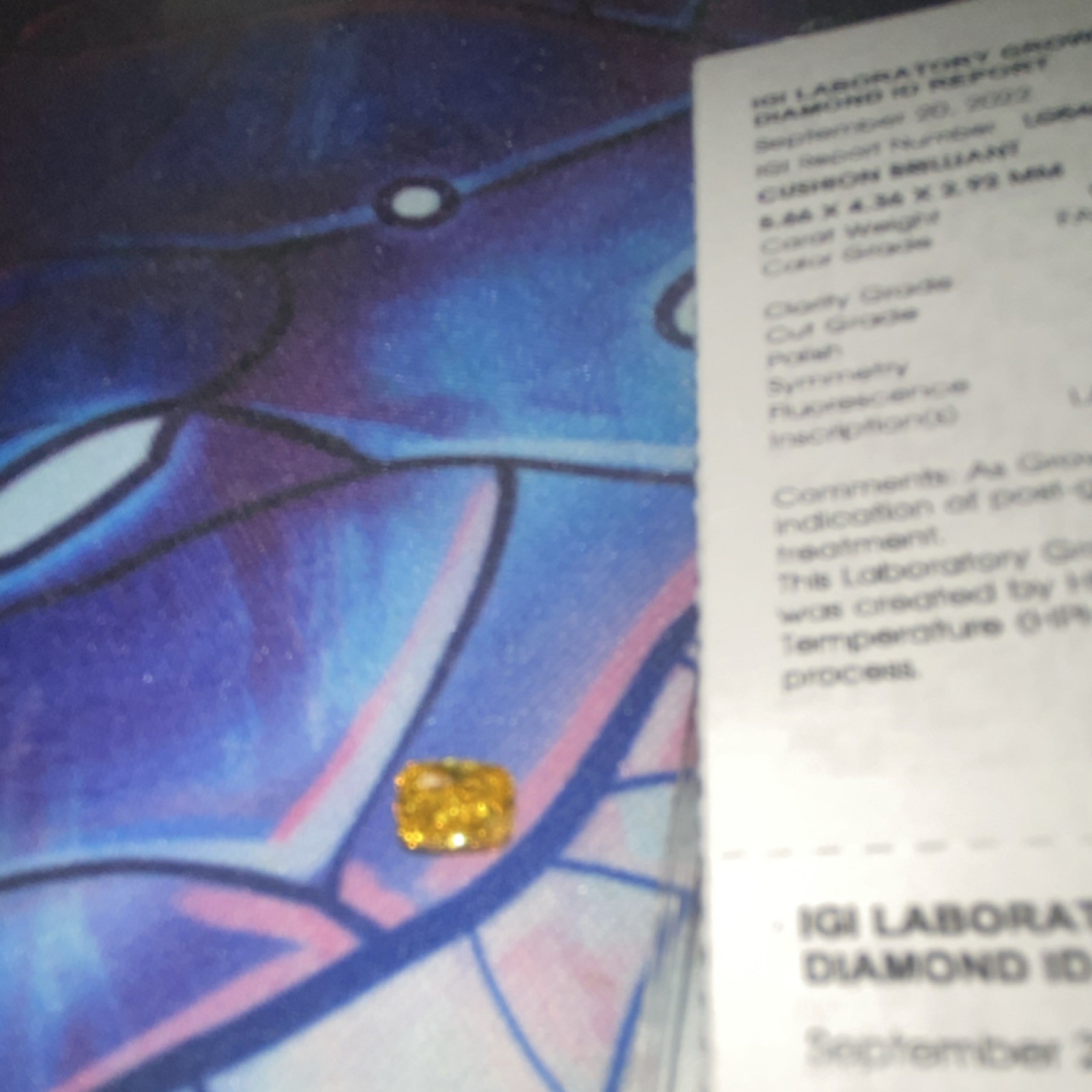 Lab-Created IGI 0.63ct Fancy Vivid Yellow Cushion Diamond SI2 Very Good Cut