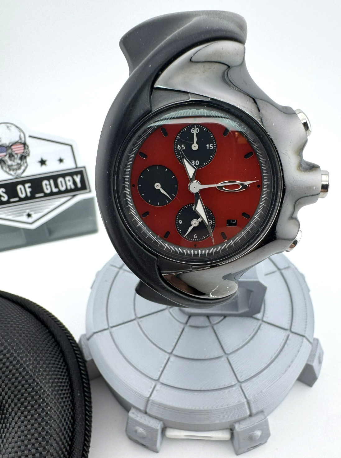 OAKLEY DETONATOR WATCH BLACK ION PLATED W/ RED CHROME DIAL RUBBER STRAP 10-148
