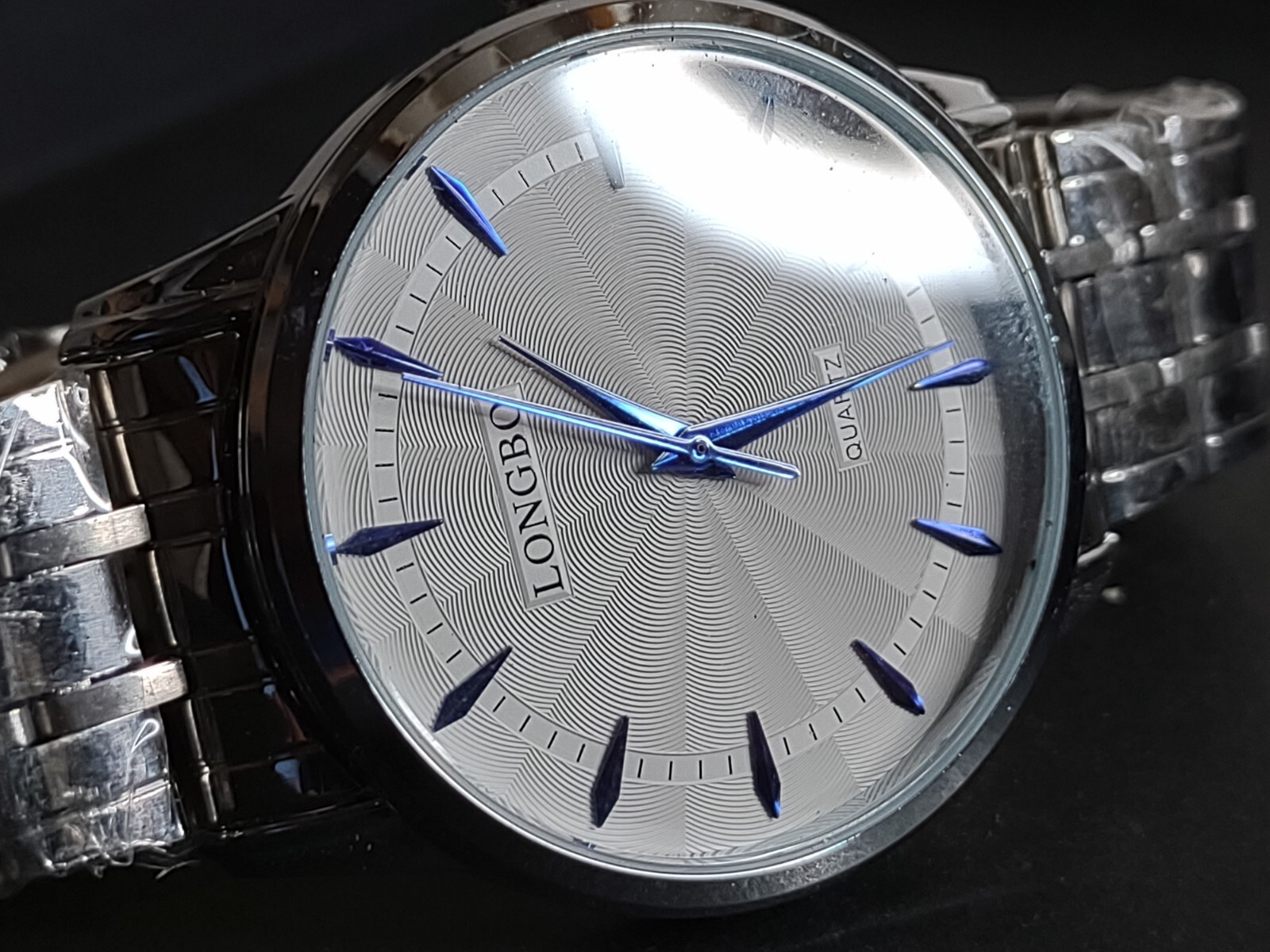 Untested 8 Inch Silver Tone And Blue Longbo Analog Watch