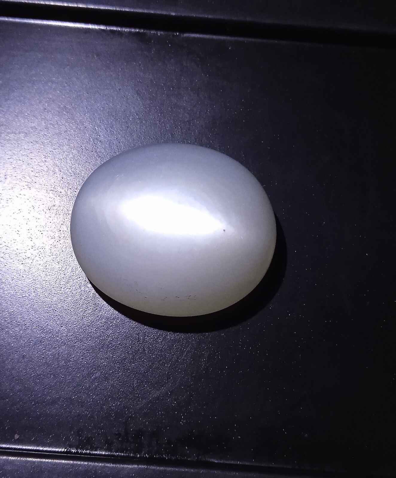 31 Carat 22.3×18.8×10.4 MM White Color Moonstone Oval Shape Cabochon Gemstone