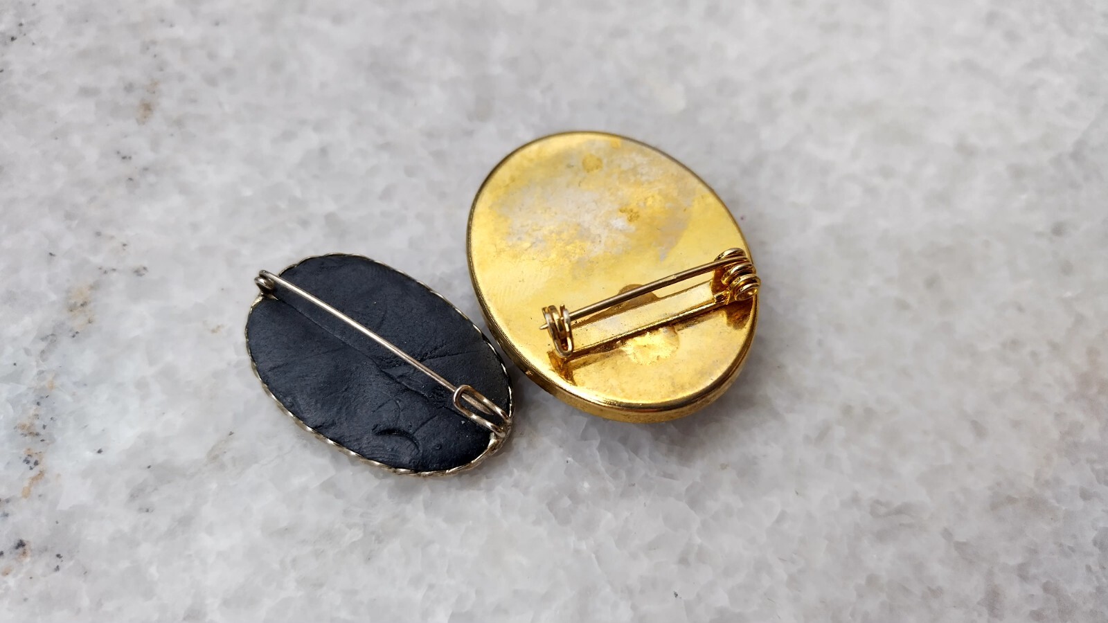 Two wonderful vintage brooches, like cameos