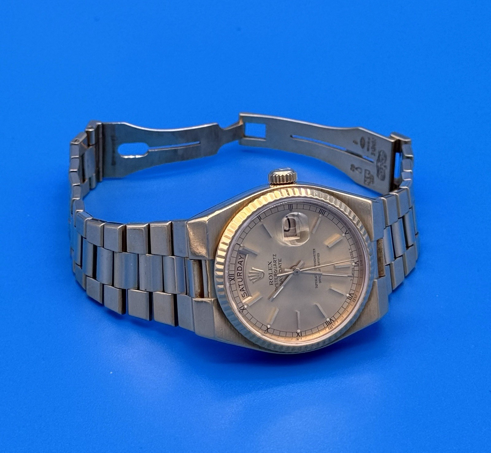 Rolex 19018 President Day Date Oysterquartz 18K Gold 36mm Champagne Dial Watch