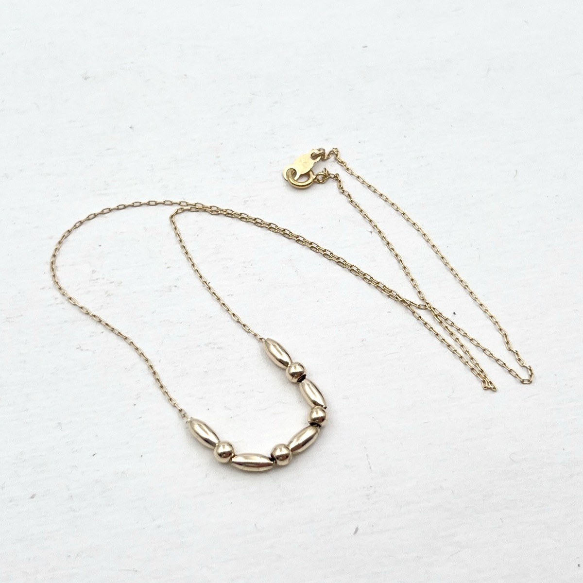 13k (14k Stamp) Yellow Gold Round & Barrel 3mm Hollow Gold Bead 15in Necklace