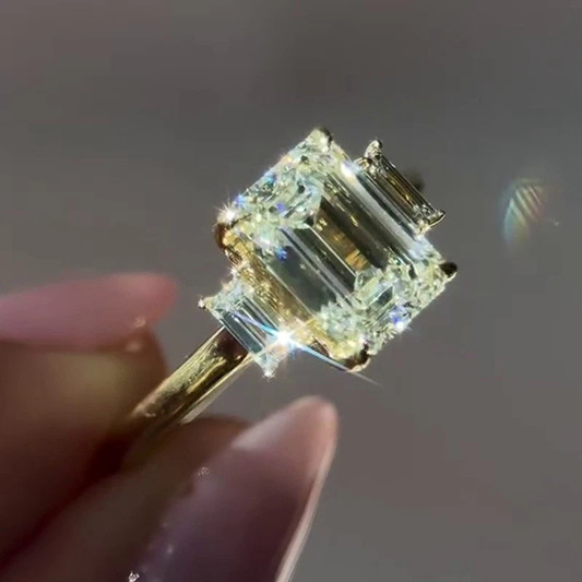 3.7CTW Emerald Cut Moissanite Three Stone Engagement Ring 14K Yellow Gold Plated