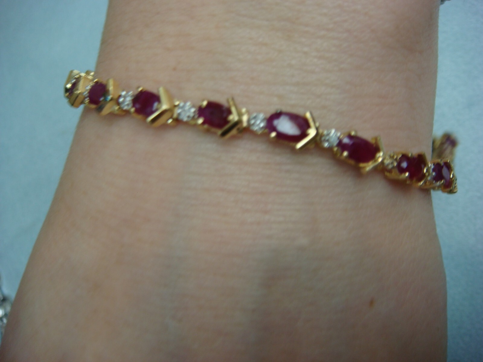 14 KT YELLOW GOLD GENUINE RUBY AND DIAMONDS TENNIS BRACELET 8.8 GRAMS 6.5 “