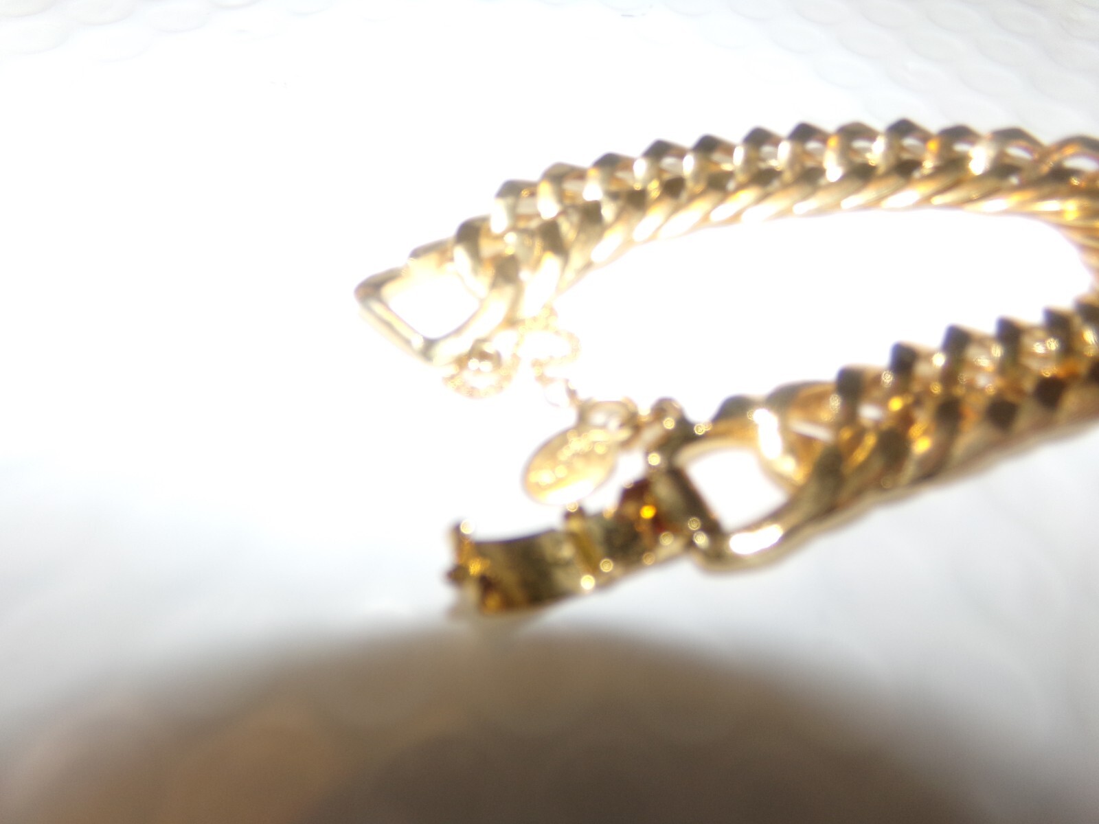 SIGNED ROGET TM GOLDTONE BRACELET WITH SAFETY CHAIN
