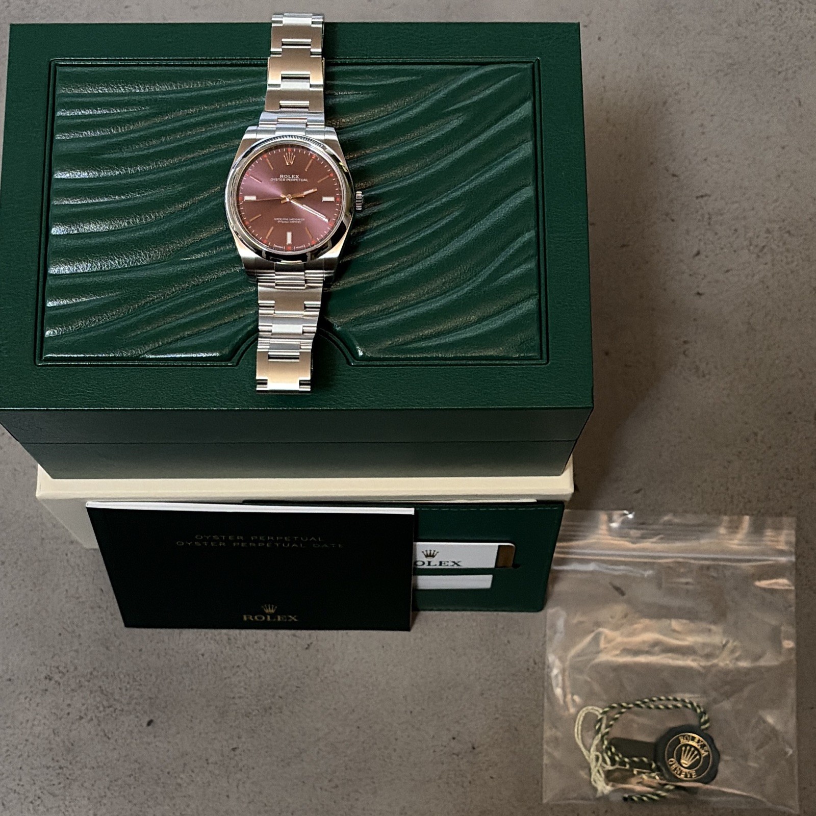 Rolex Oyster Perpetual 39mm Red Grape Dial Steel Automatic 114300