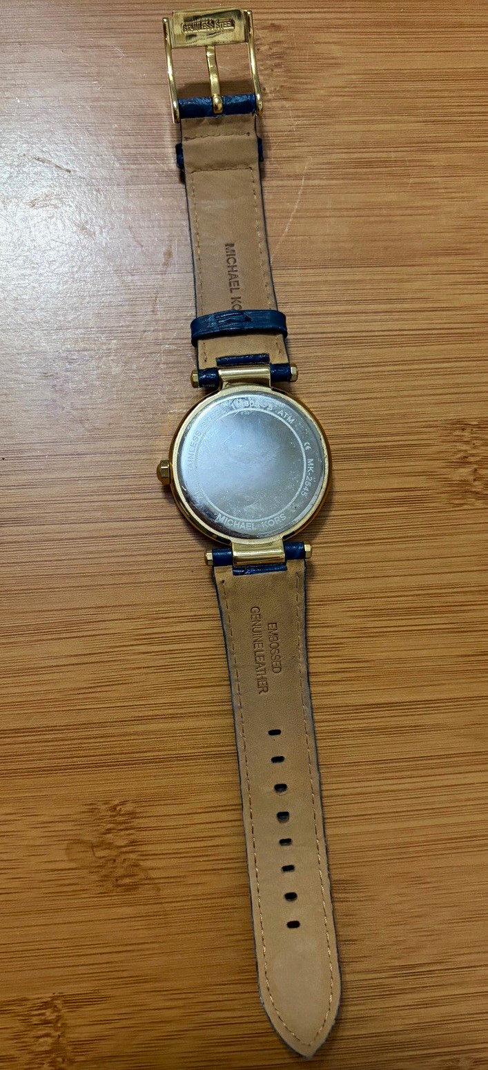 Michael Kors MK-3253 Women’s Blue Dial Gold-Tone Crystal Bezel Quartz Watch