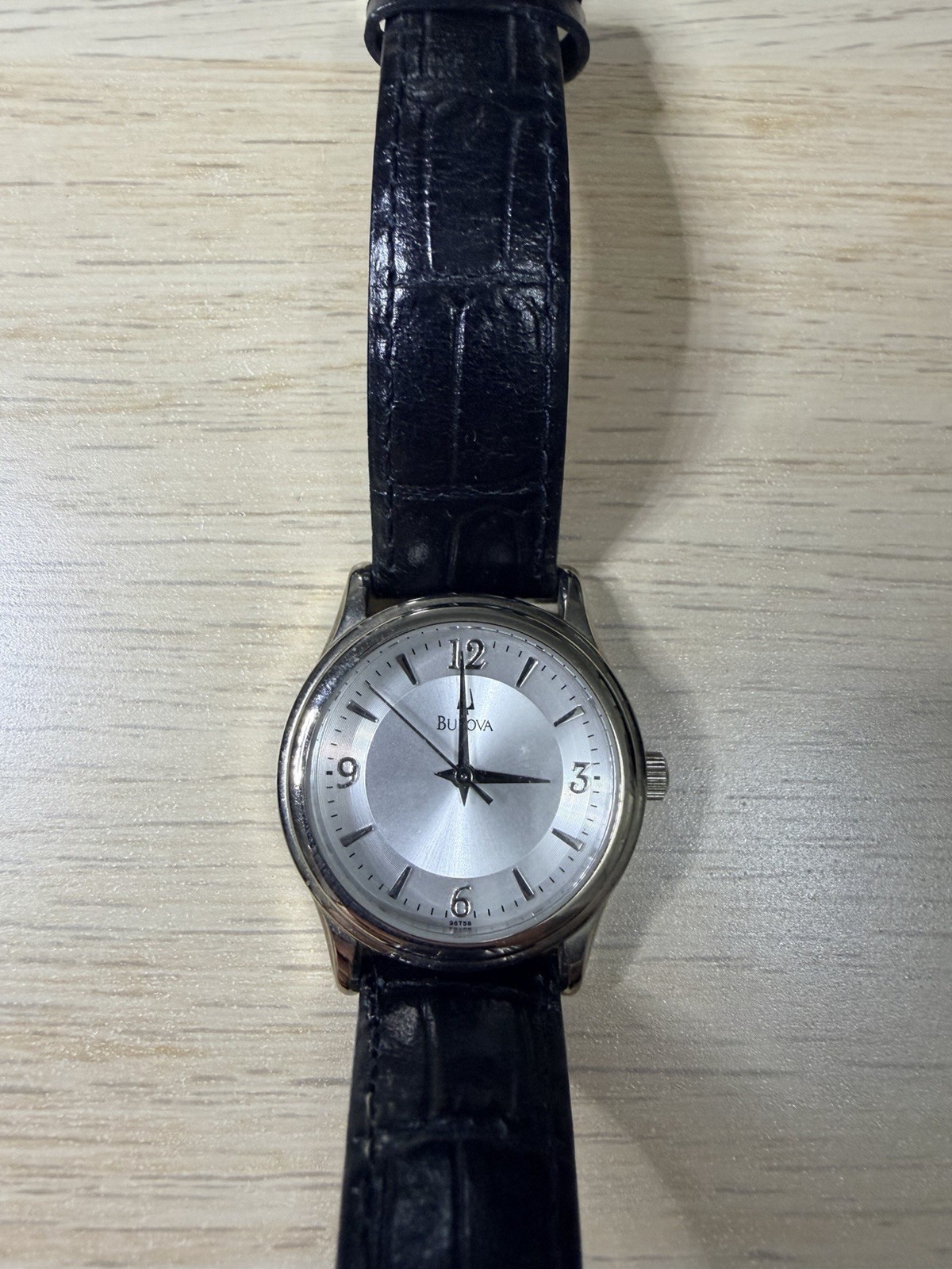 Bulova 96T58 Lady’s Watch 2007 Silver Dial Black Leather Band. Needs Battery