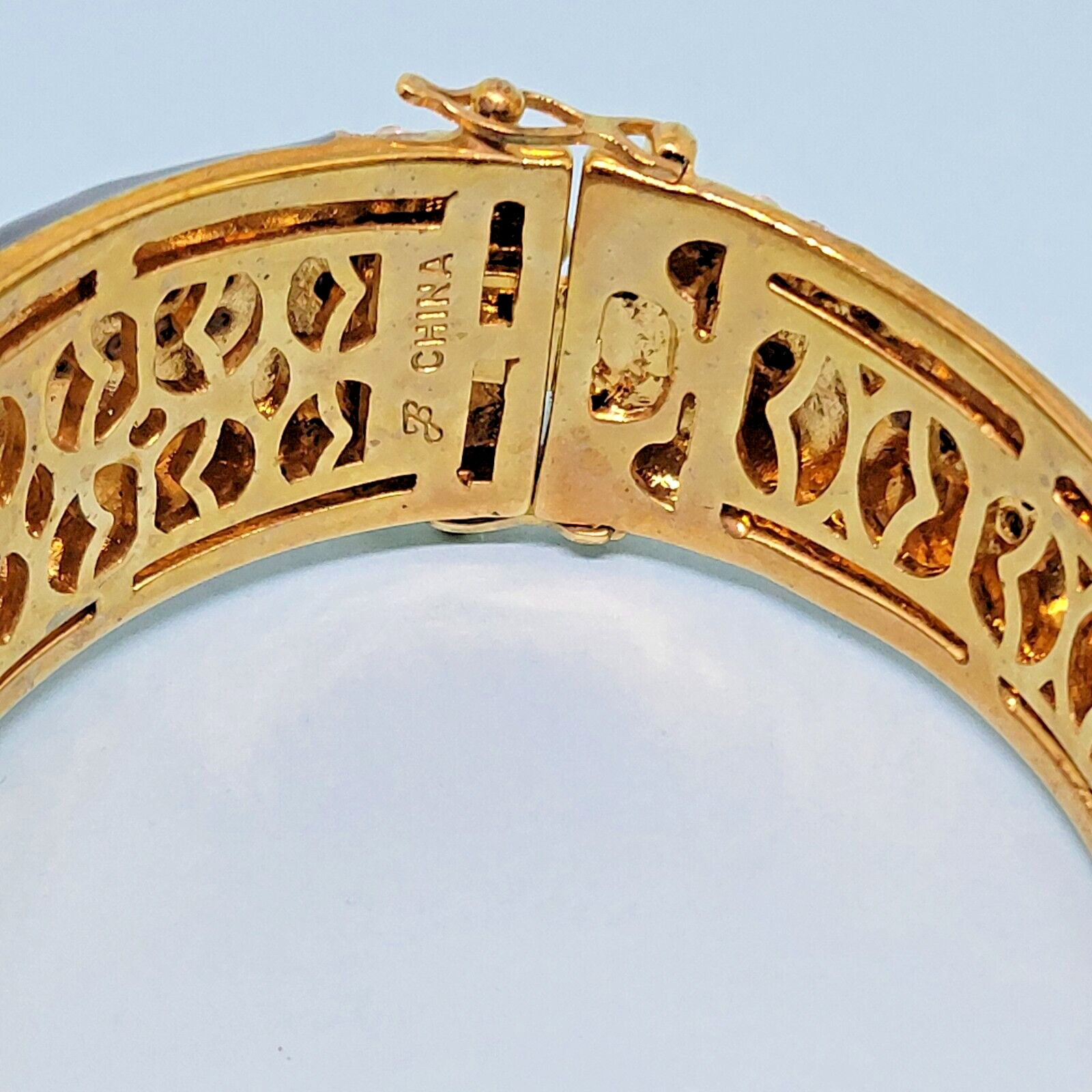 Joan Boyce Gold Tone Black Enamel Crystal Maltese Cross Hinged Bangle Bracelet