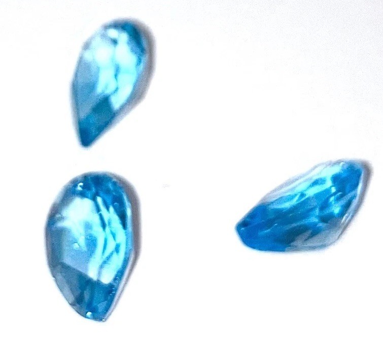 Topaz Swiss Blue 9 x7 mmm Pear shaped stones set of 3 approx 25 carats