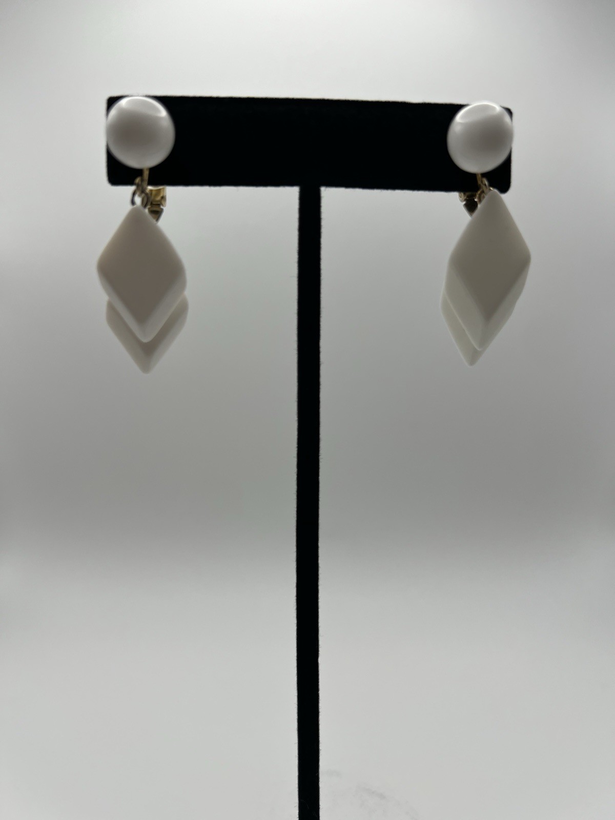 Trifari Signed Diamond Shape Clip-On earrings white & gold, lucite/acrylic