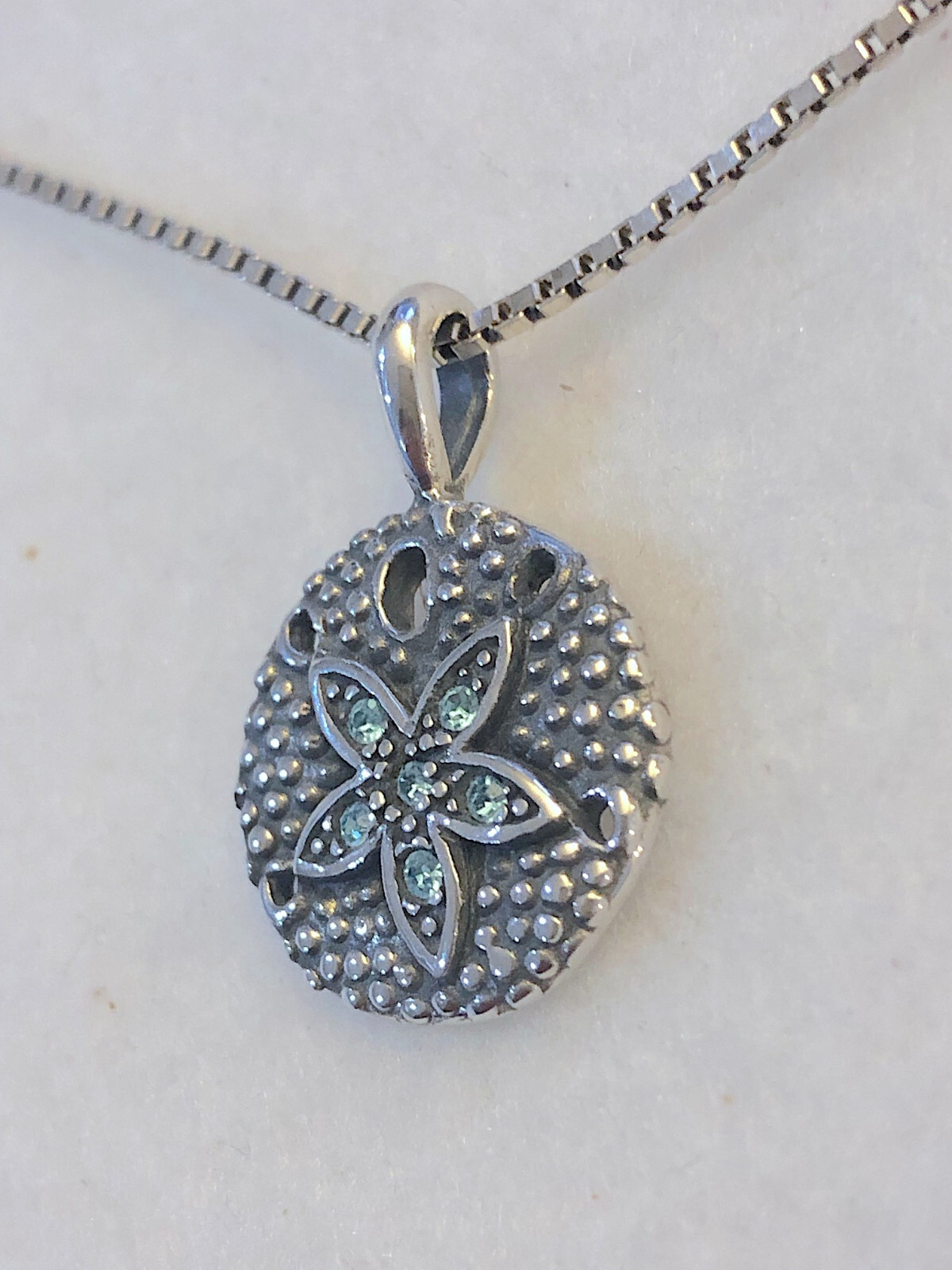 Wildthings Sterling Silver Sand Dollar Pendant w/Faceted Aqua Crystal Stones