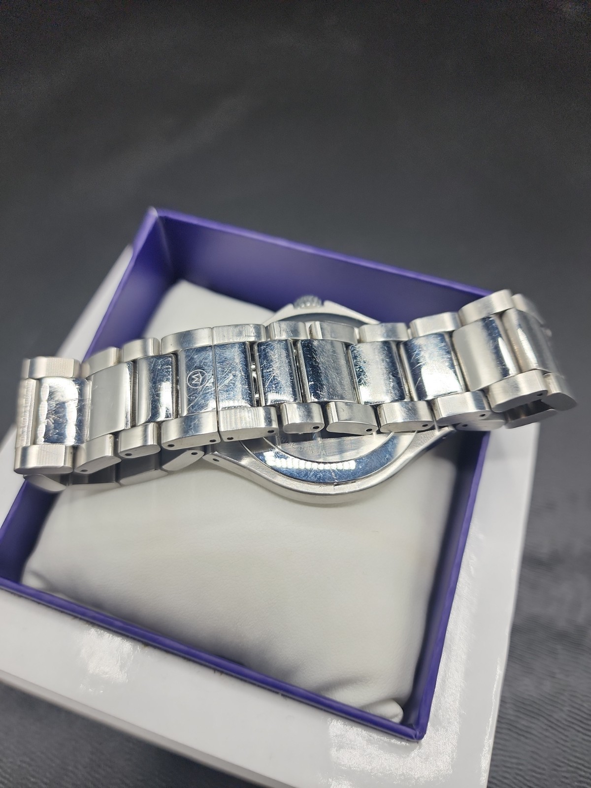Movado Stainless Steel Defio Men’s Blue Museum Dial Dress Watch new battery