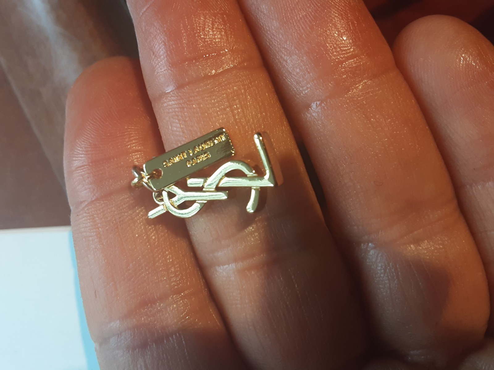 YSL charm pendant stamped zipper pull
