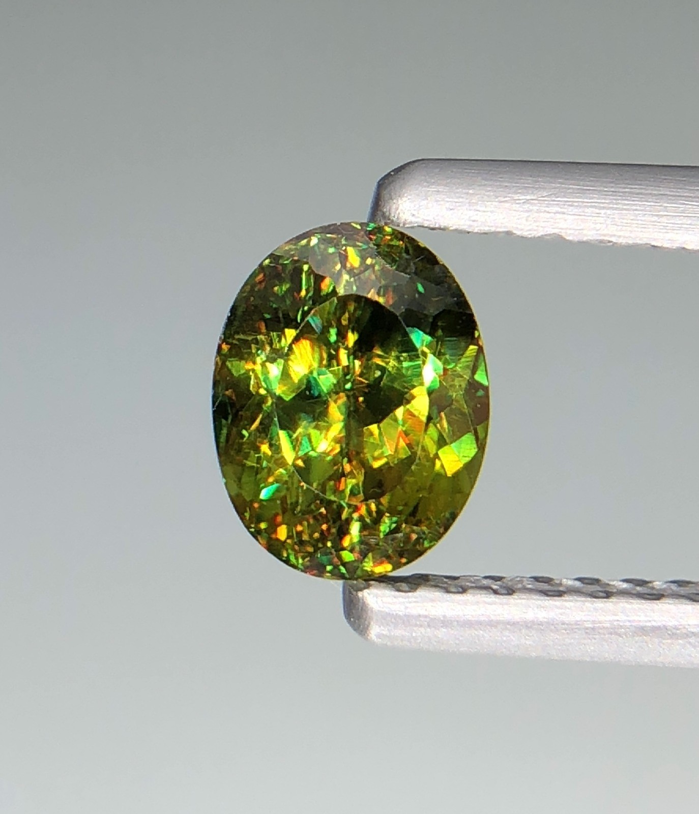 0.91 Ct Natural Faceted Full Fire Sphene / Titanite Oval Cut Loose Gemstone