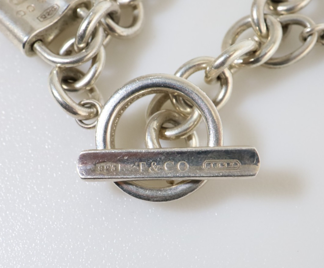 Authentic Vintage Tiffany & Co. 925 Silver Multi Charm Toggle Bracelet 16 cm.