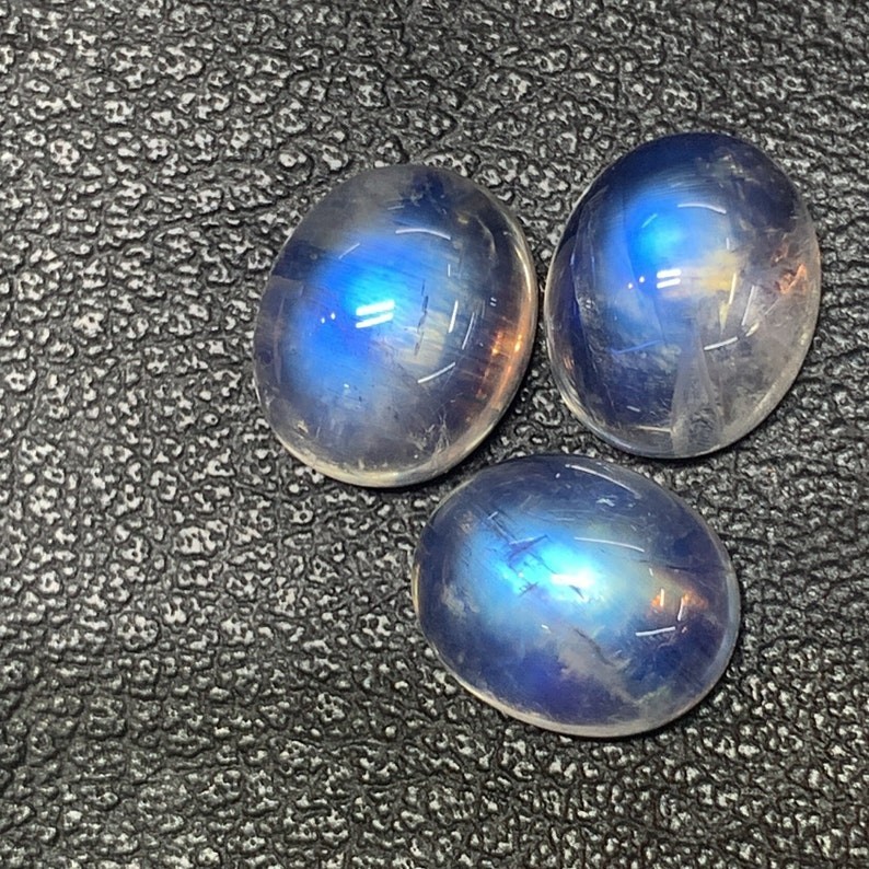 AAAAAA Quality Rainbow Moonstone Blue Fire Oval Shape Cabochon Size 10X12 MM