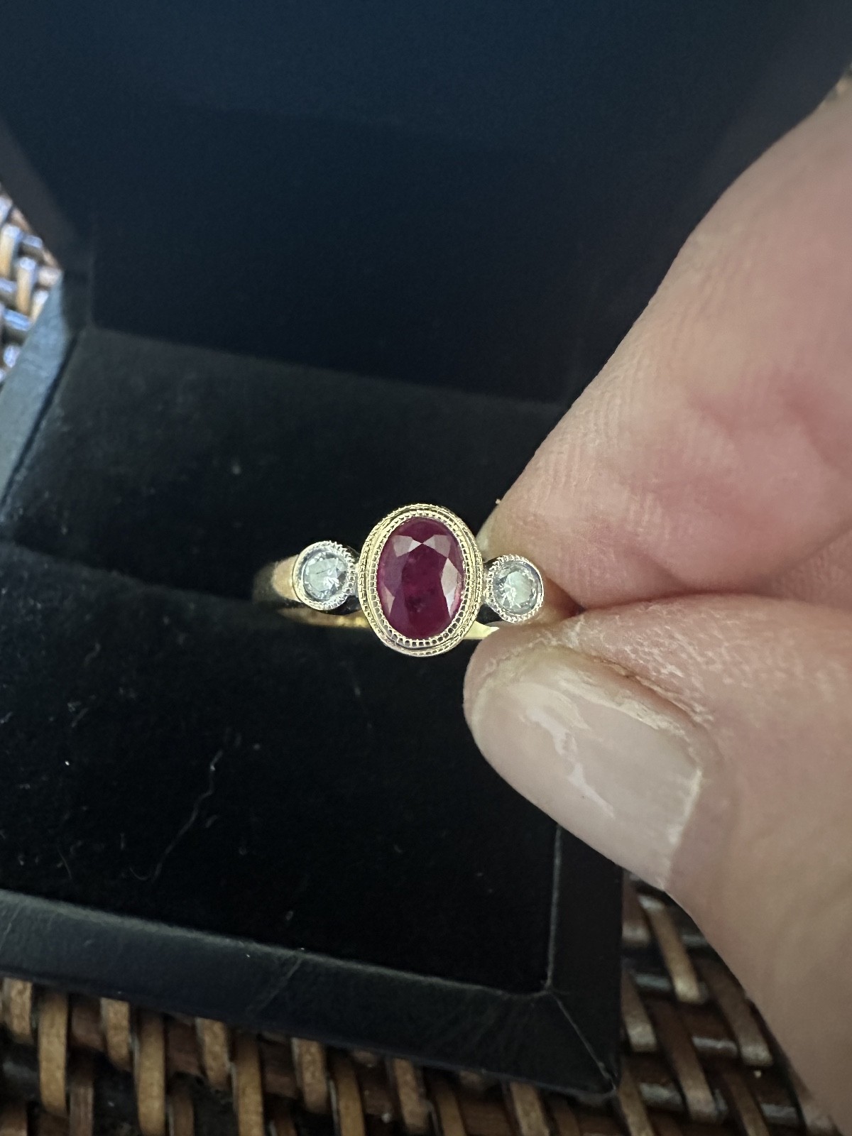 Ruby and Diamond Bezel set ring in 14K yellow gold size 5.5