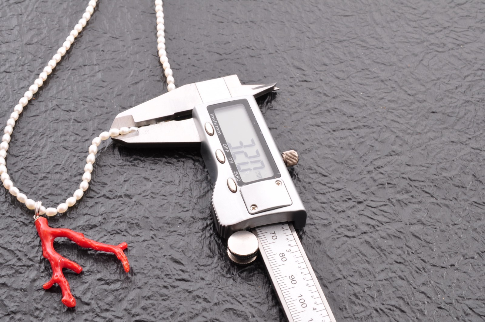 Sterling silver clasp, red coral and pearl pendant (total 54.0ct) Certification.