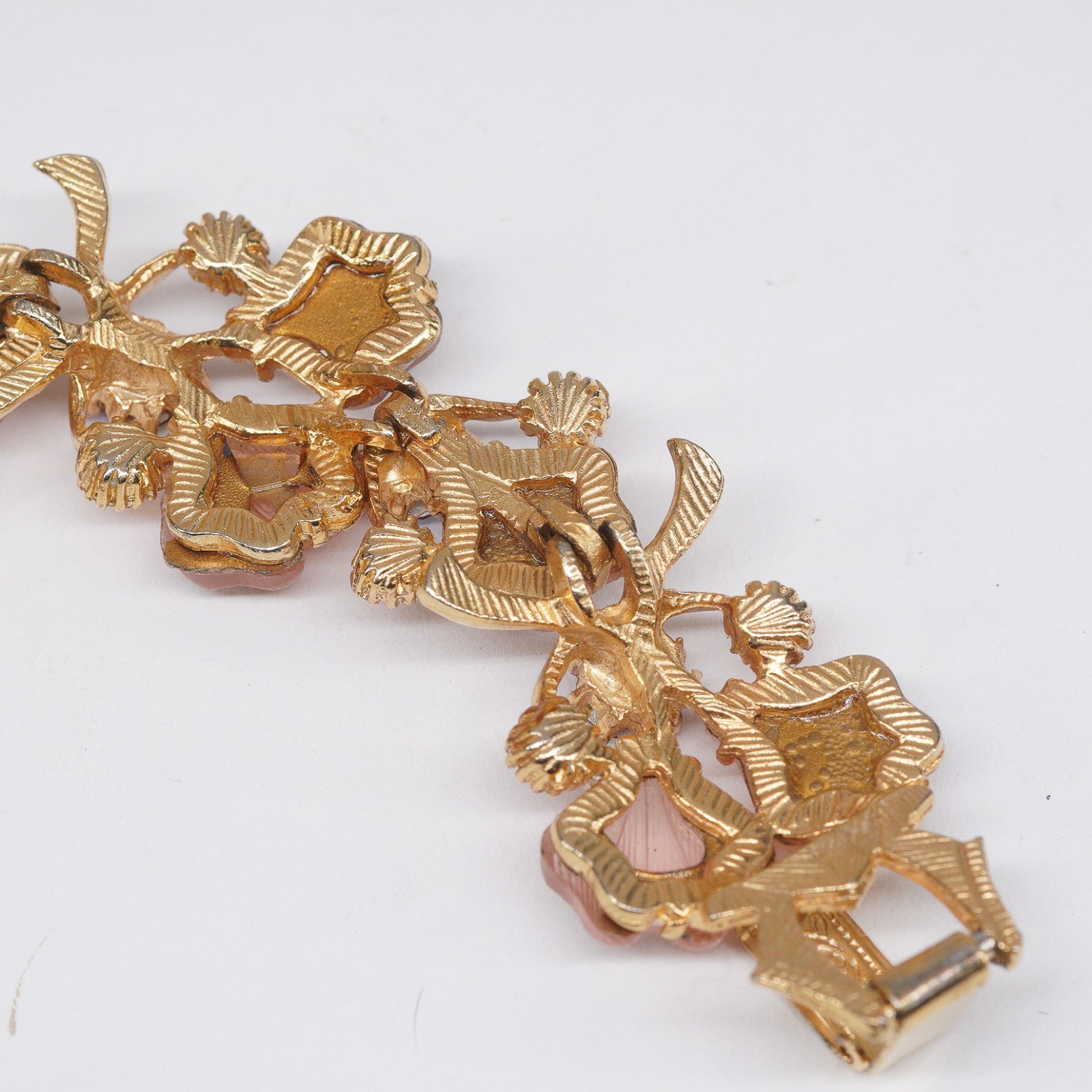 VTG bracelet Molded Glass Leaves AB Pink Rhinestones in Goldtone fold over clasp