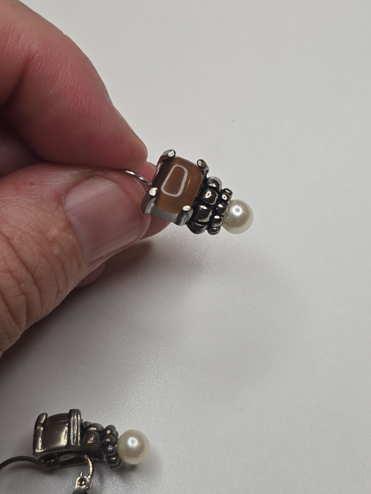 sterling silver Lagos earrings, smoky quartz stone and pearl accent.