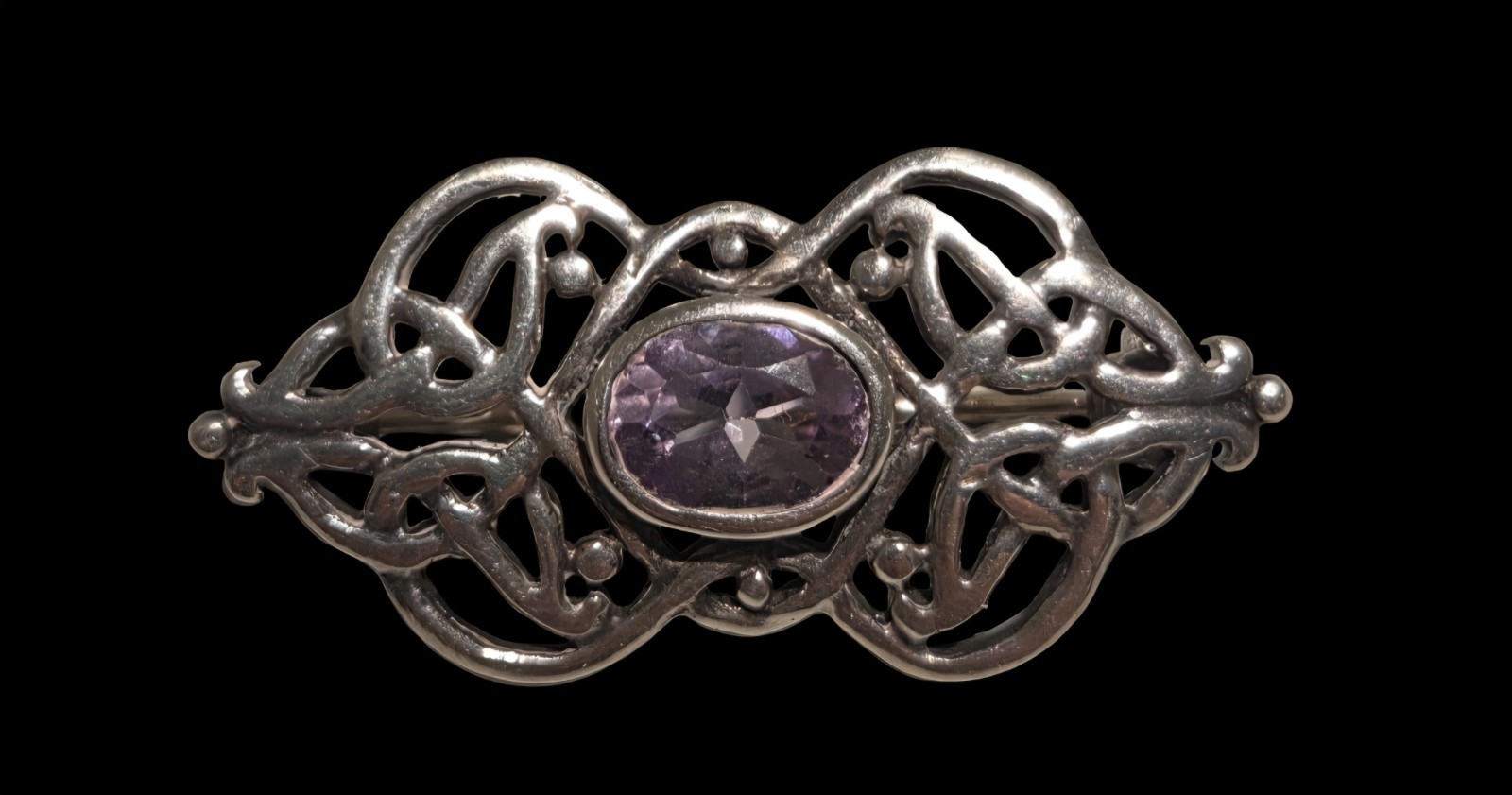 Alexander Castle 925 sterling silver brooch featuring an amethystcolored Stone
