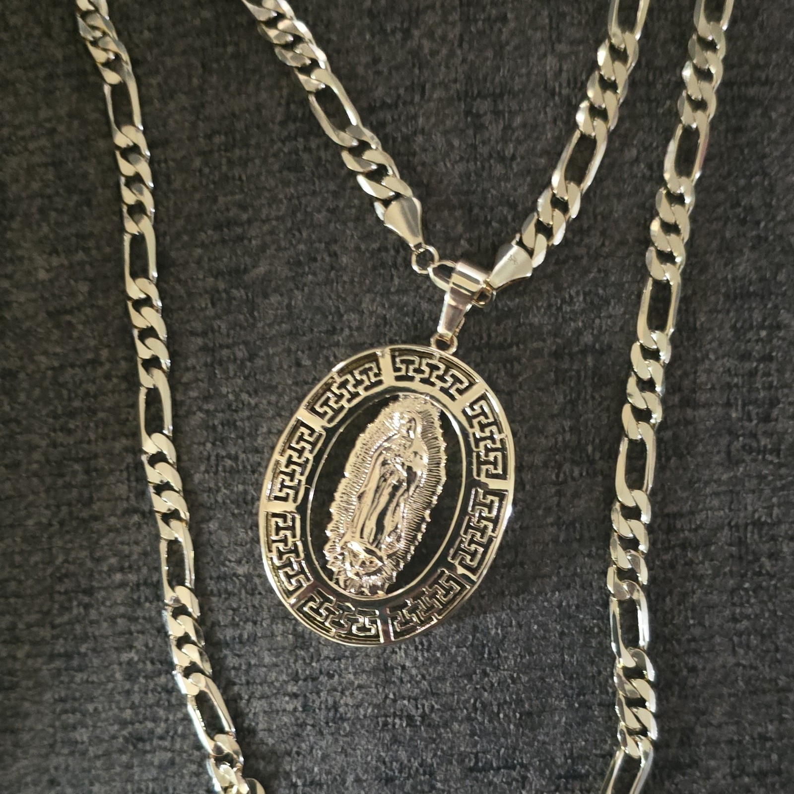 Virgin Mary Pendant And 14k Stamped Figaro 22/24in Chain
