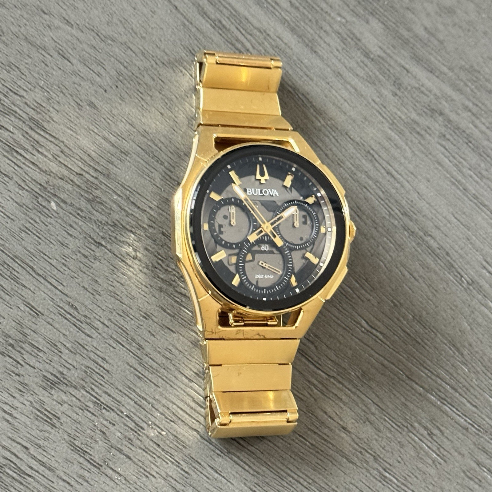 Bulova Curv Black Dial Men’s Watch – 97A144 Gold Tone Stainless