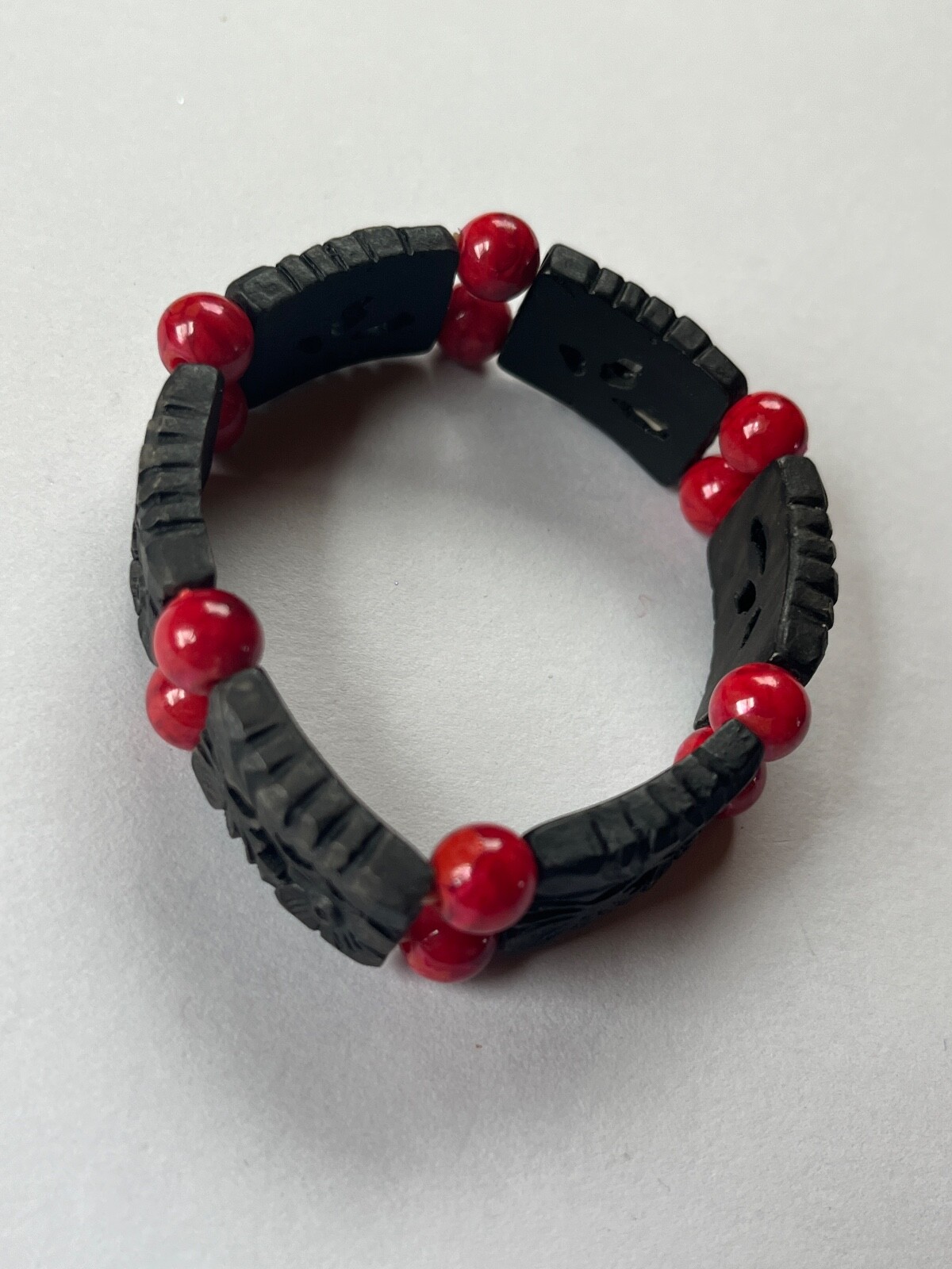 Alternating Carved Black Floral Rectangle & Red Round Plastic Beads Stretch Brac