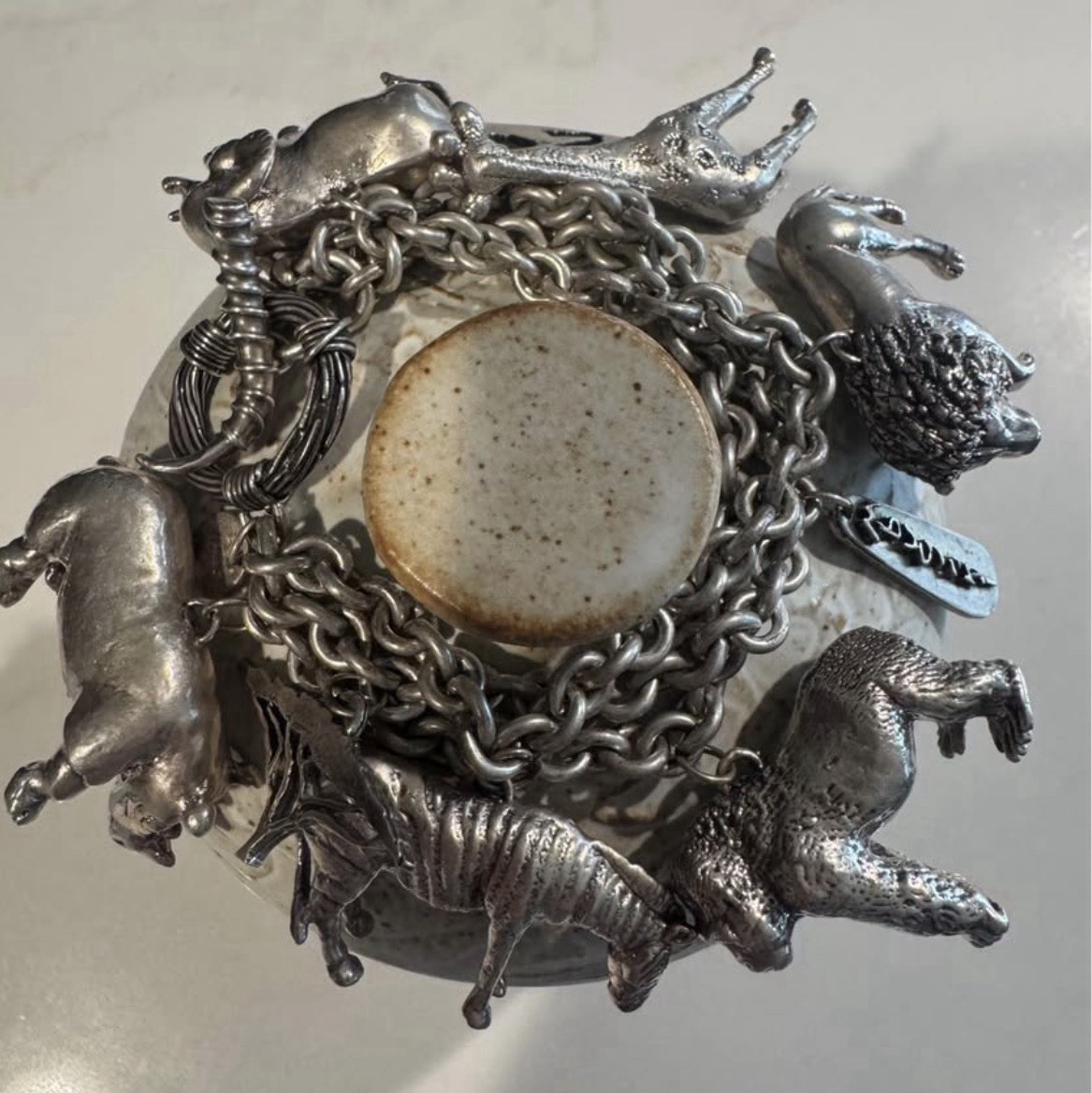 Signed Susan Cummings statement sterling silver African animal charm bracelet