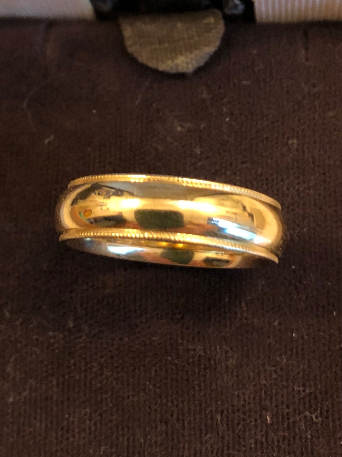 Man’s 6mm 14 K yellow gold comfort fit milgrain edge size 10.25