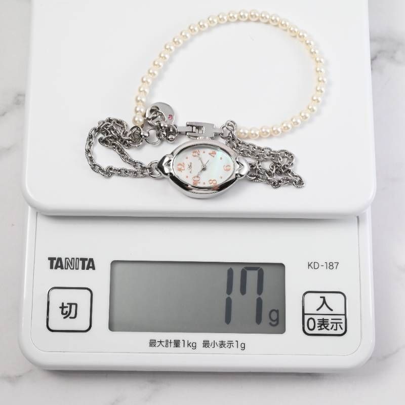 sara ladies’ wristwatch pearl bracelet watch oval shell dial heart motif silver